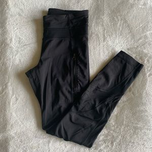 Lululemon black with mesh and zipper pants, size 4